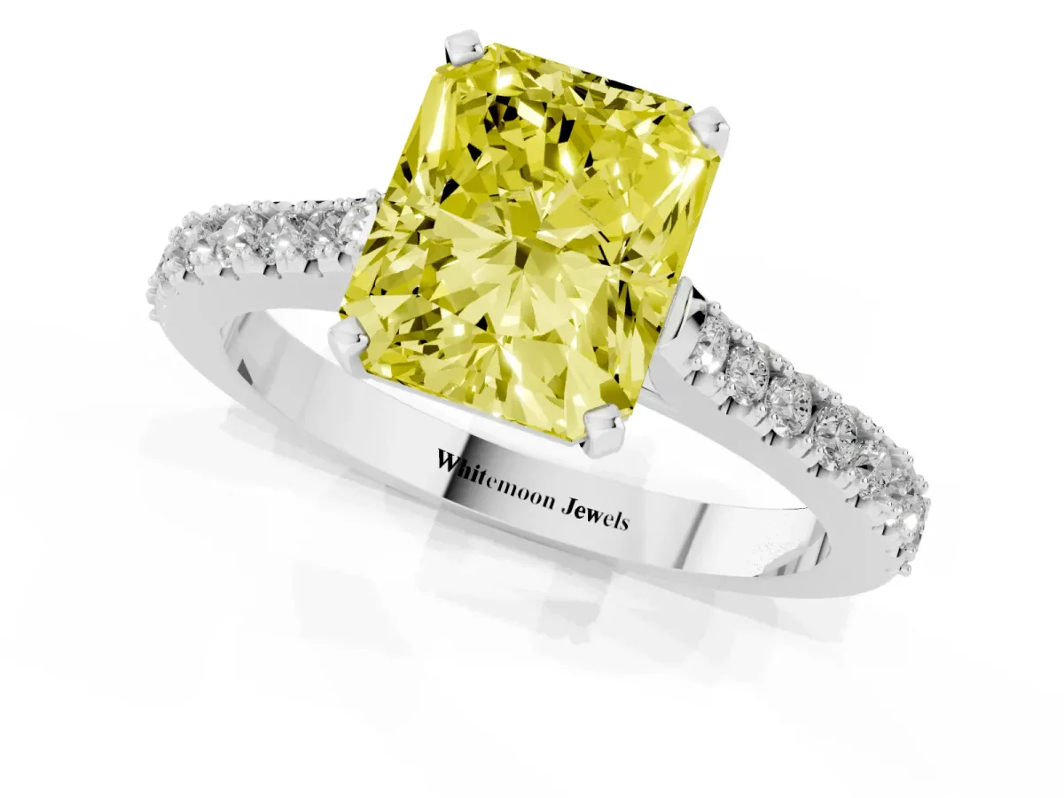 Fancy Yellow Radiant Cut Cut Solitaire Diamond Engagement Ring with Pave Band and Four-Prong Setting Platinum