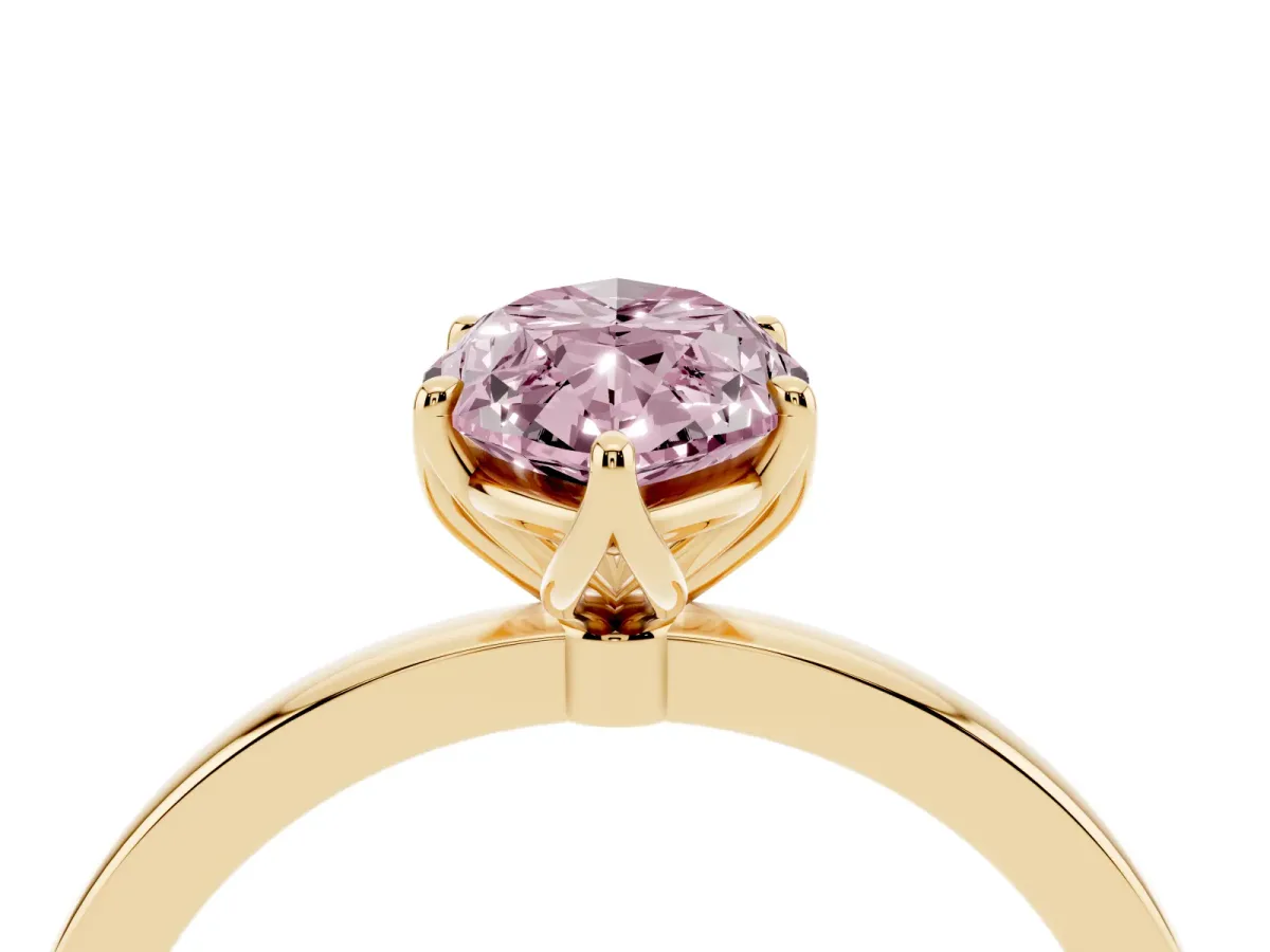 Fancy Pink Marquise Cut Diamond Solitaire Ring with Thin Band and Prong Setting Yellow gold