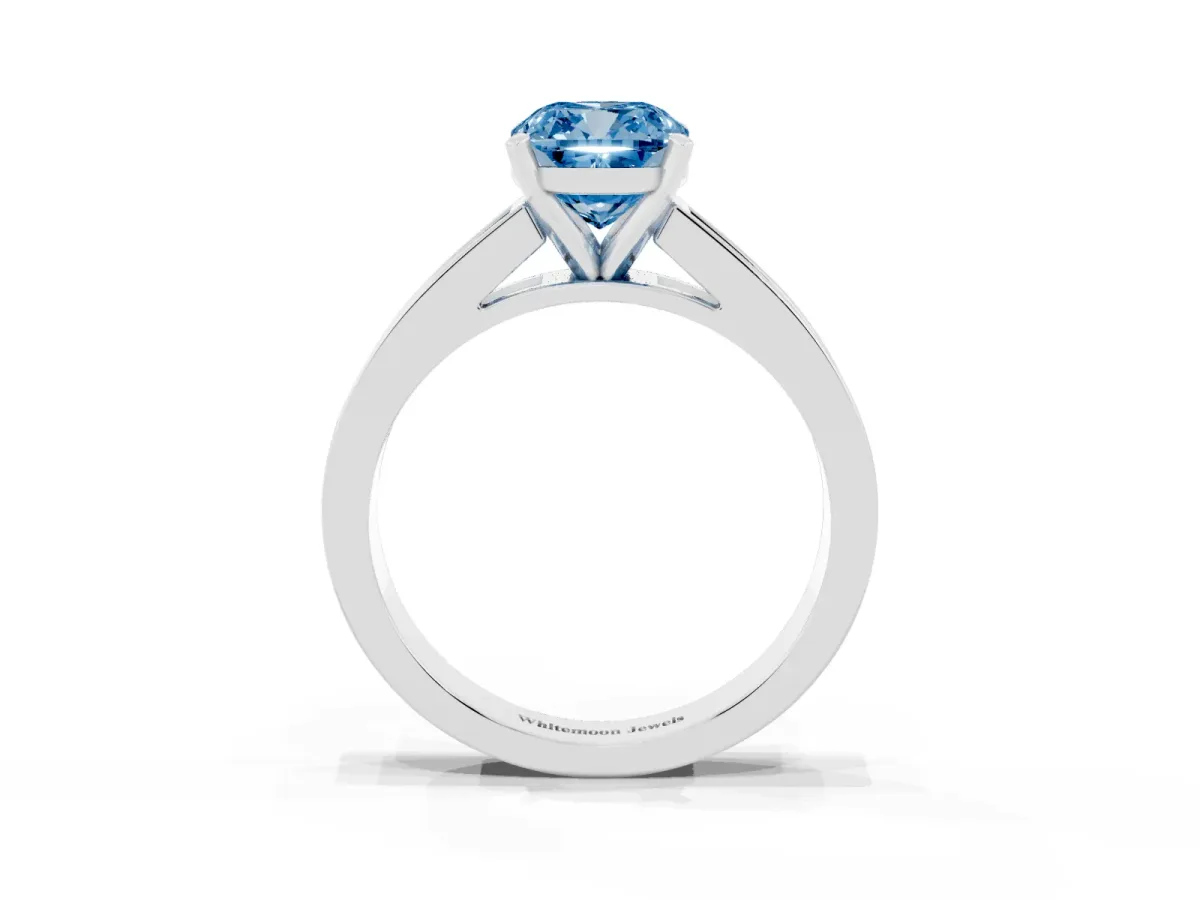 Fancy Blue Cushion Cut Solitaire Diamond Ring with Channel-Set Band and Four-Prong Setting Silver