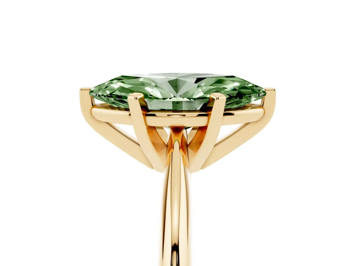 Fancy Green Marquise Cut Cut Solitaire Ring with Four-Prong Setting on a Classic Band Yellow gold