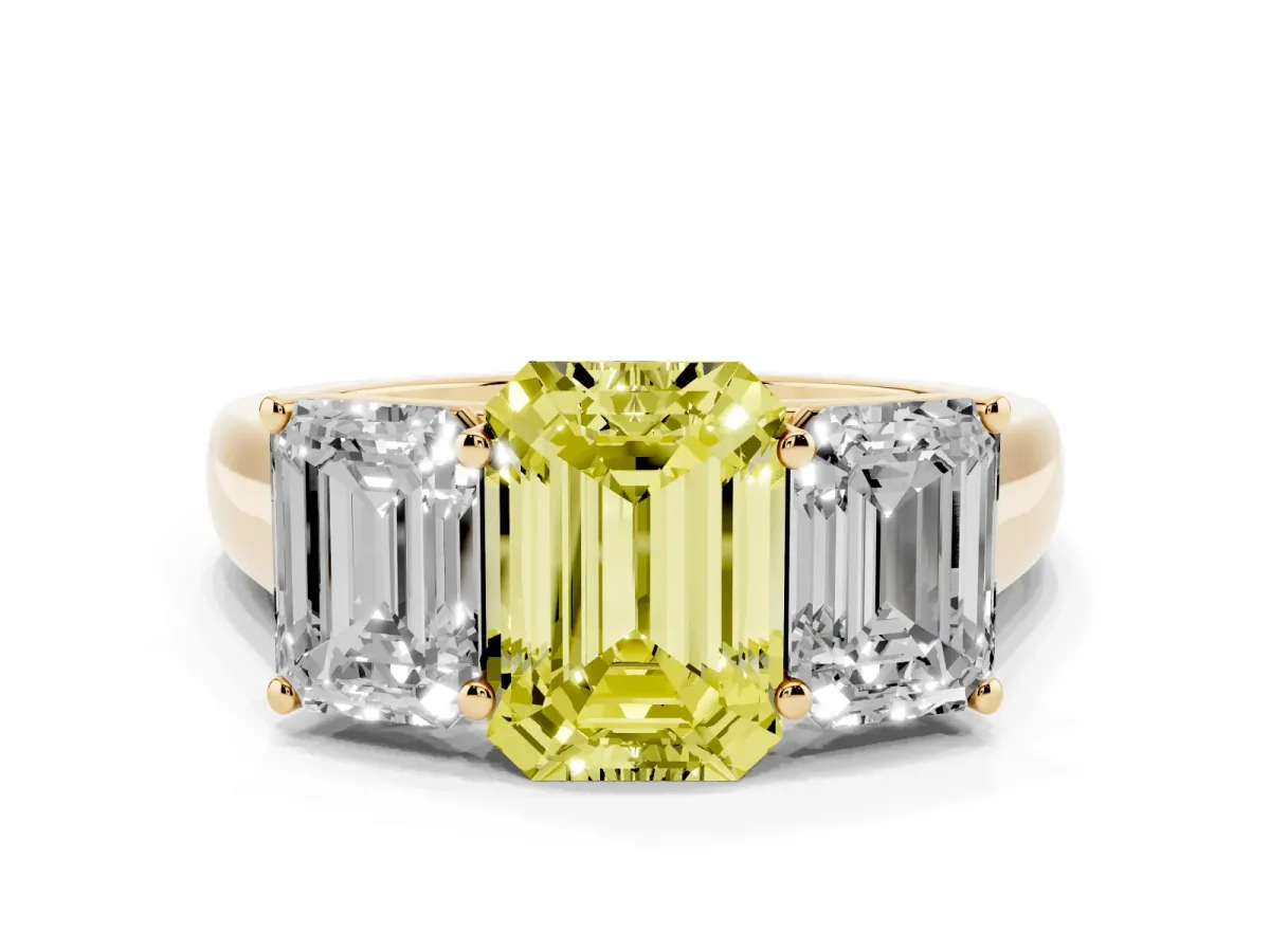 Fancy Yellow Emerald Cut Three-Stone Diamond Ring with Prong Setting on a Classic Band Yellow gold