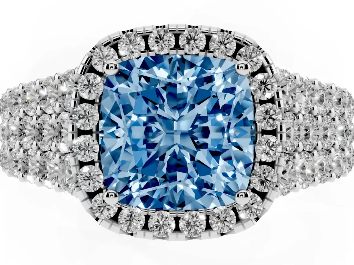 Fancy Blue Cushion Cut Diamond Halo Engagement Ring with Triple Row Round Pavé Band and Prong Setting Silver