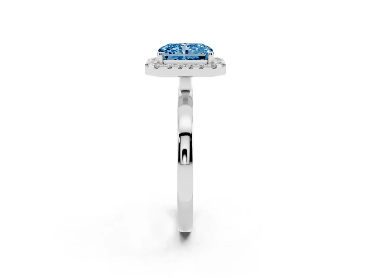 Fancy Blue Radiant Cut Halo Diamond Solitaire with Pavé Band and Four-Prong Setting White gold