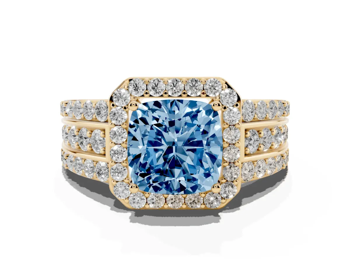 Fancy Blue Cushion Cut Halo Diamond Ring with Round Split Shank and Prong Setting Yellow gold