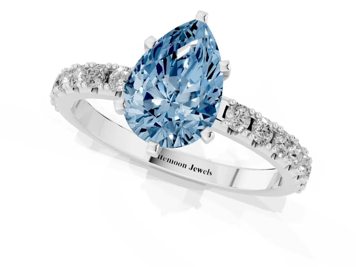 Fancy Blue Pear Cut Diamond Solitaire Pavé Band with Four-Prong Setting Platinum
