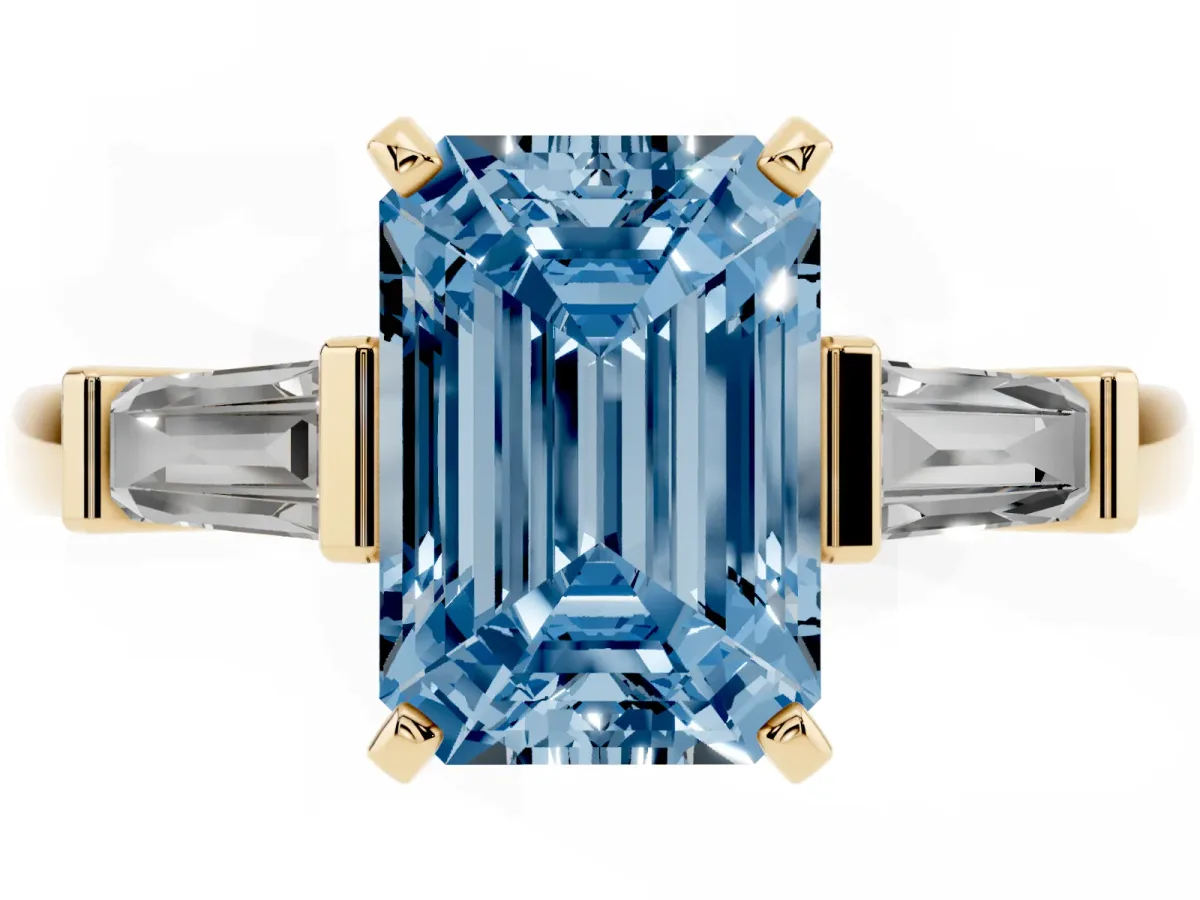 Fancy Blue Emerald Cut Cut Diamond Solitaire Ring with Tapered Baguette Accents and Four-Prong Setting Yellow gold