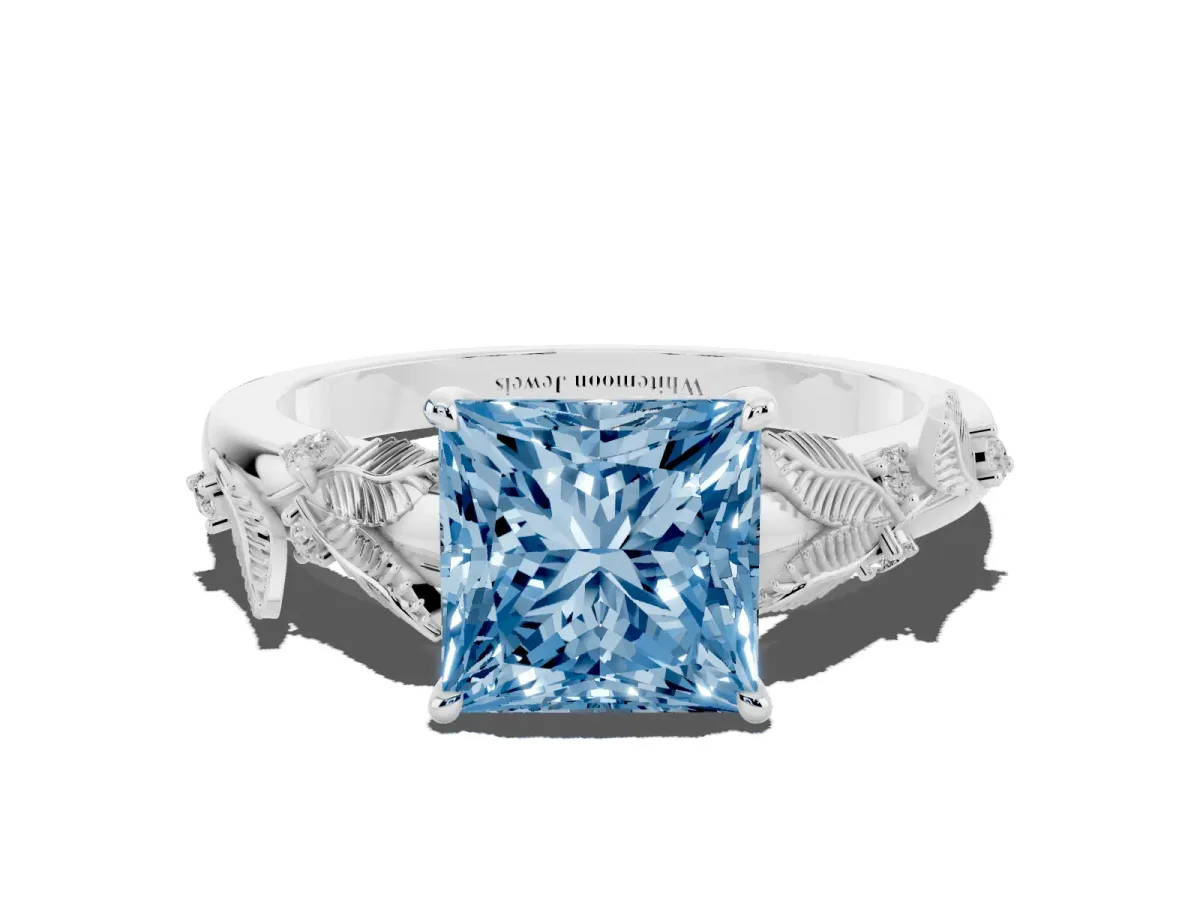Fancy Blue Princess Cut Diamond Solitaire Ring with Leaf Motif Band and Four-Prong Setting Silver