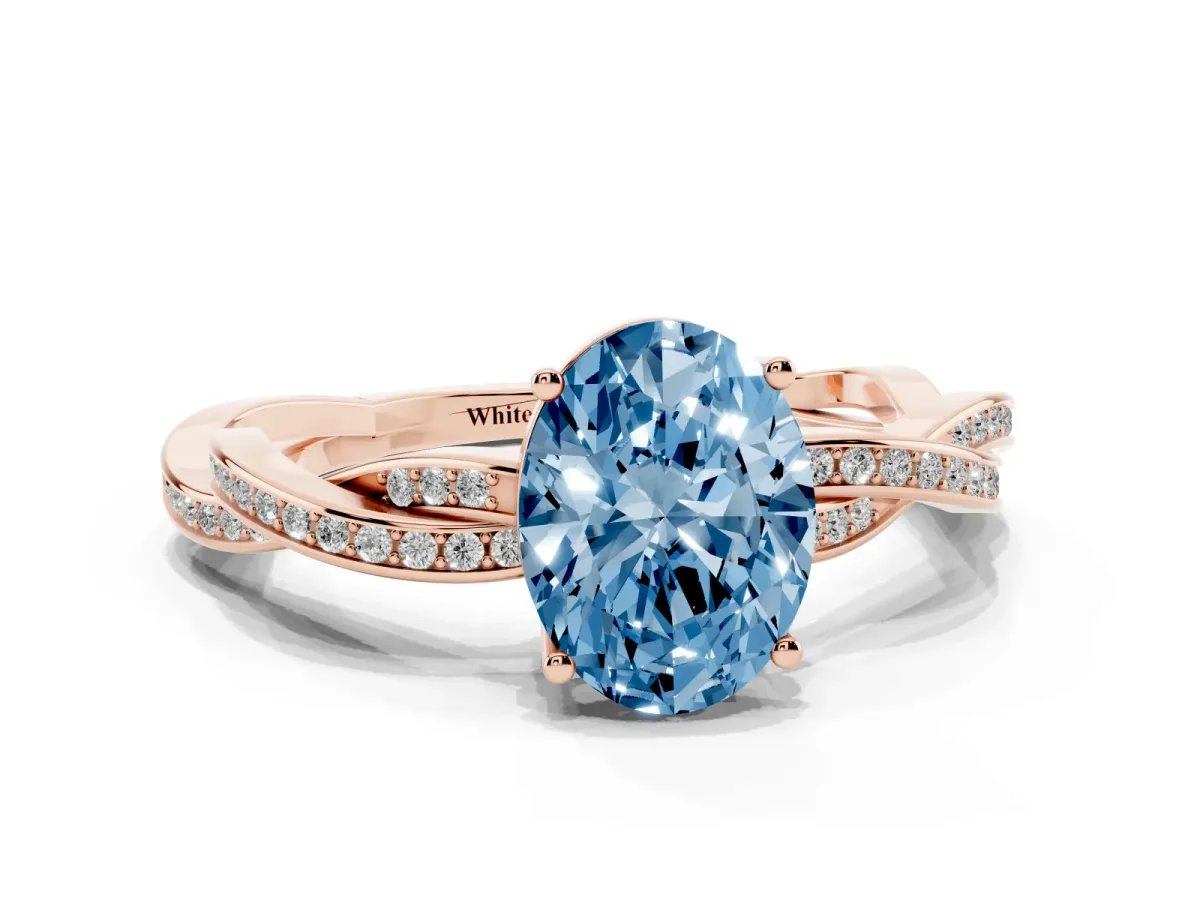Fancy Blue Oval Cut Solitaire Twisted Pave Diamond Ring with Four-Prong Setting Rose gold