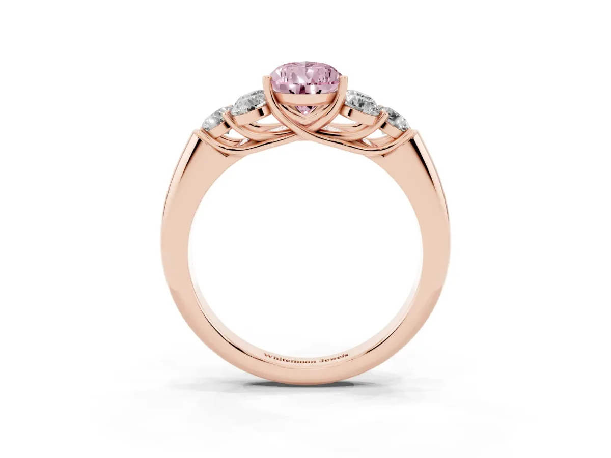 Fancy Pink Pear Cut Cut Diamond Cluster Ring with Round Accent Stones and Prong Setting on a Classic Band Rose gold