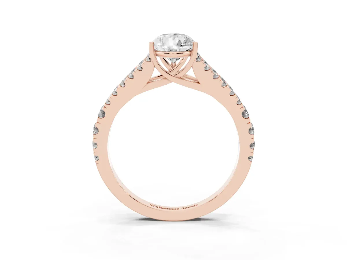 Pear Cut Diamond Split Shank Engagement Ring with Round Pavé and Prong Setting Rose gold