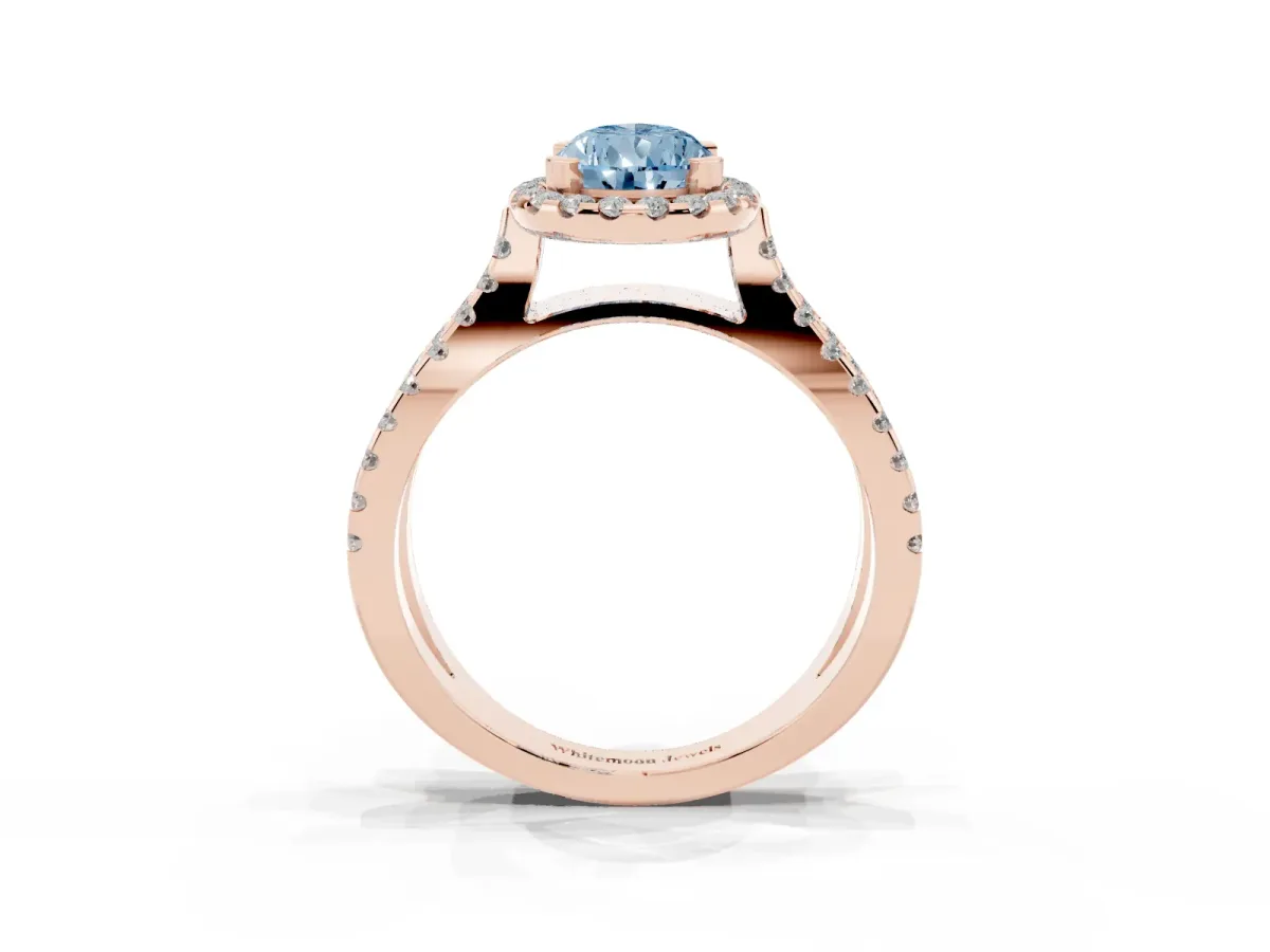 Fancy Blue Pear Cut Diamond Halo Ring with Split Shank Pavé Band and Prong Setting Rose gold