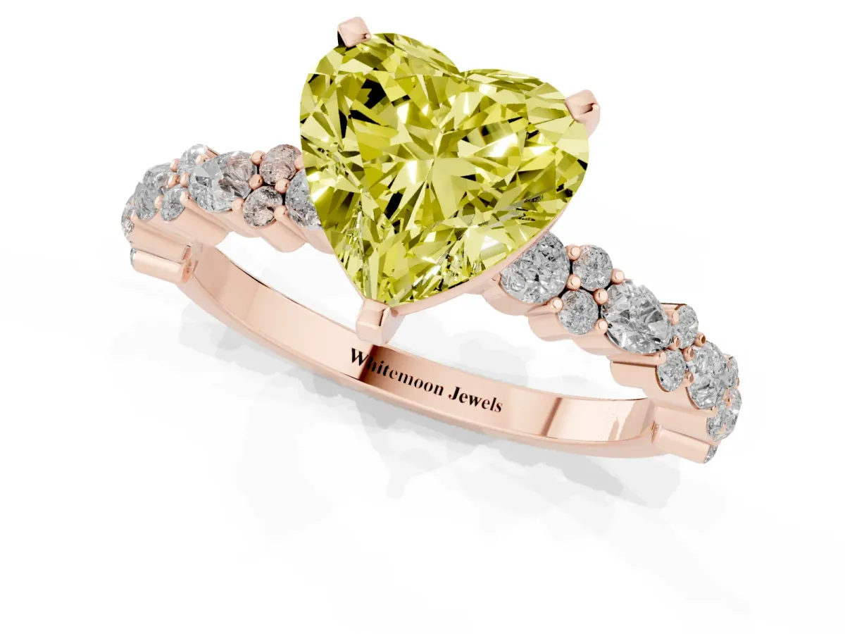 Fancy Yellow Heart Cut Diamond Side Stone Solitaire Ring with Round and Four-Prong Setting Rose gold