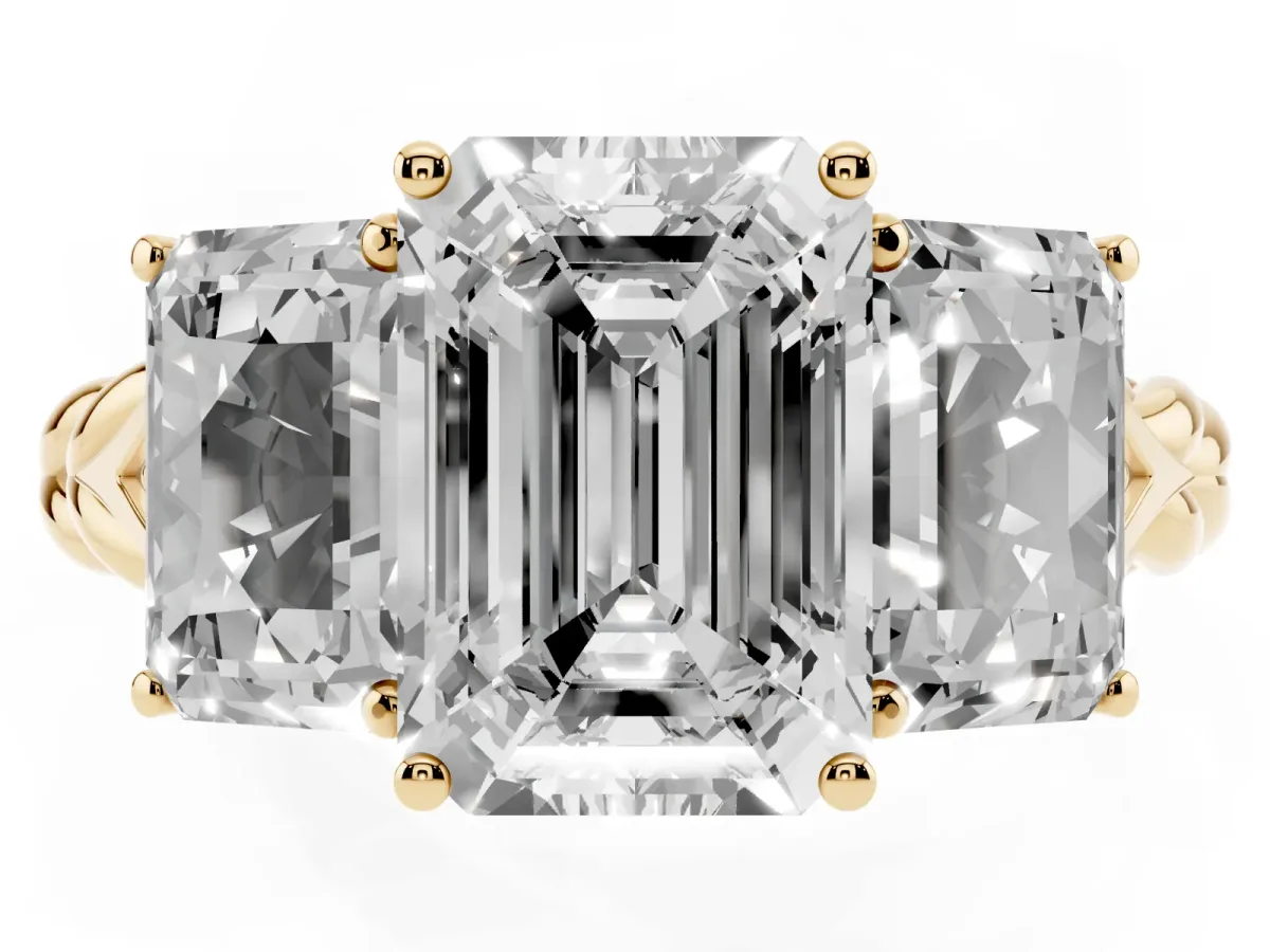 Three-Stone Emerald Cut Diamond Braided Band Ring with Four-Prong Setting Yellow gold