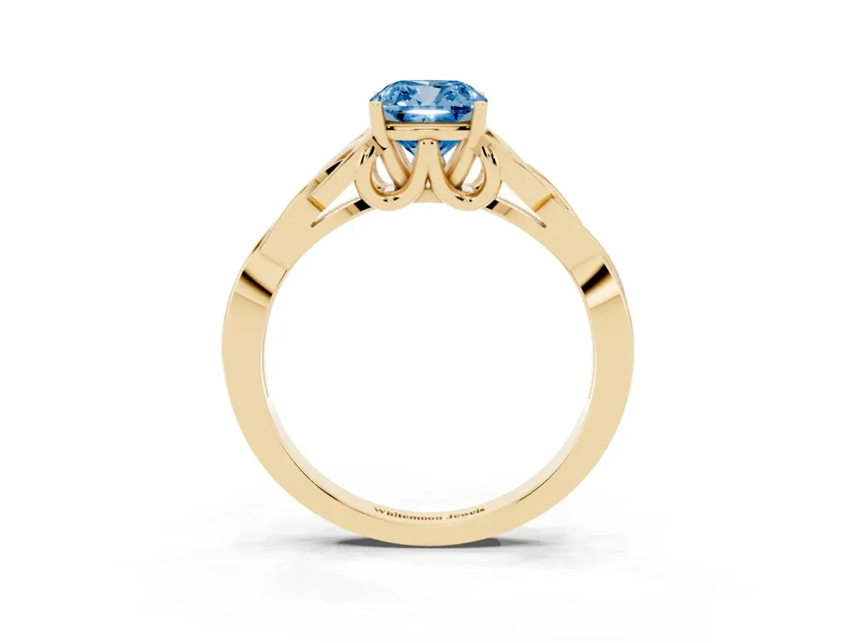 Fancy Blue Cushion Cut Diamond Solitaire Engagement Ring with Celtic Knot Band and Four-Prong Setting Yellow gold