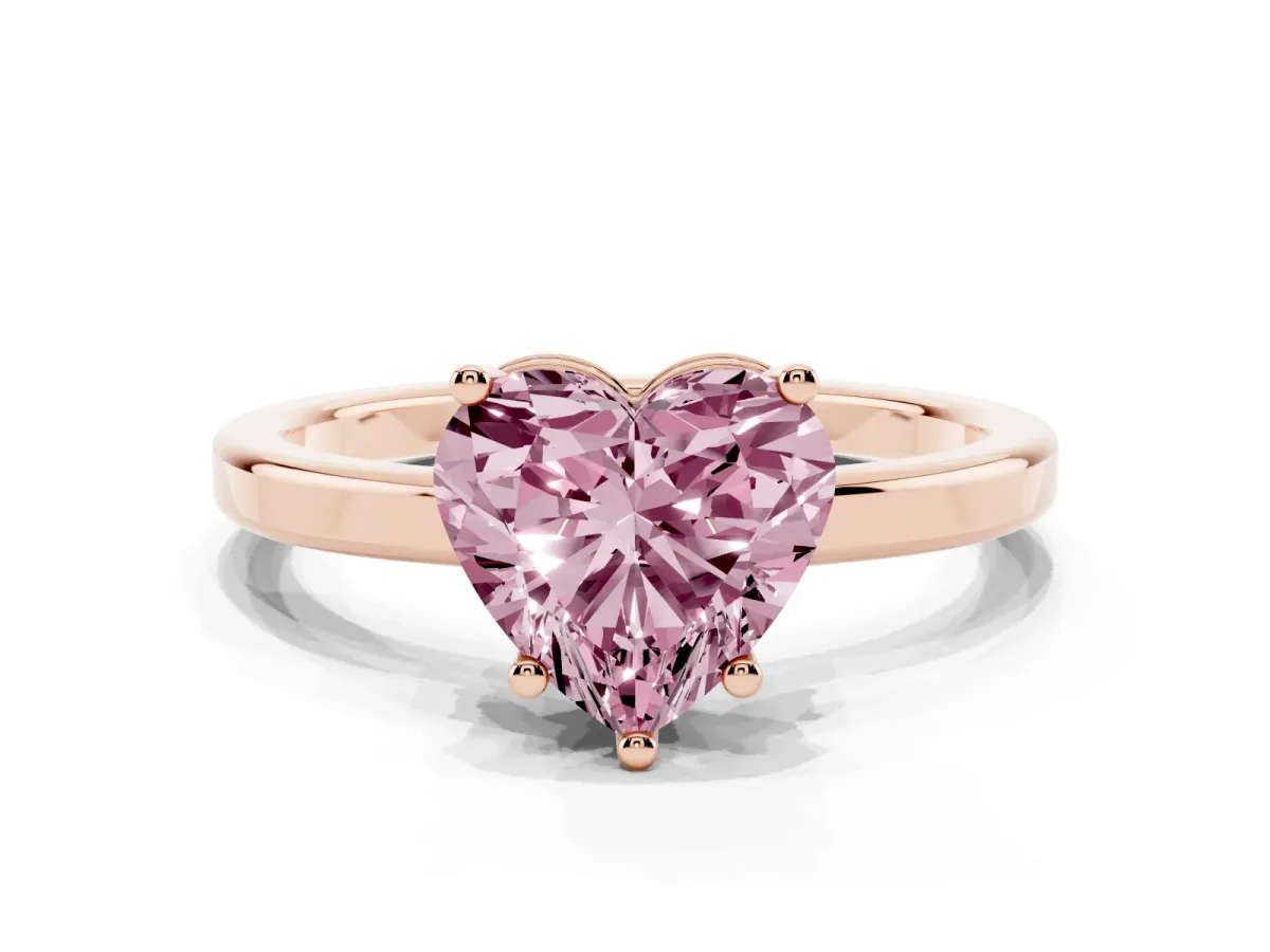 Fancy Pink Heart Cut Cut Solitaire Engagement Ring with Four-Prong Setting on a Classic Band Rose gold