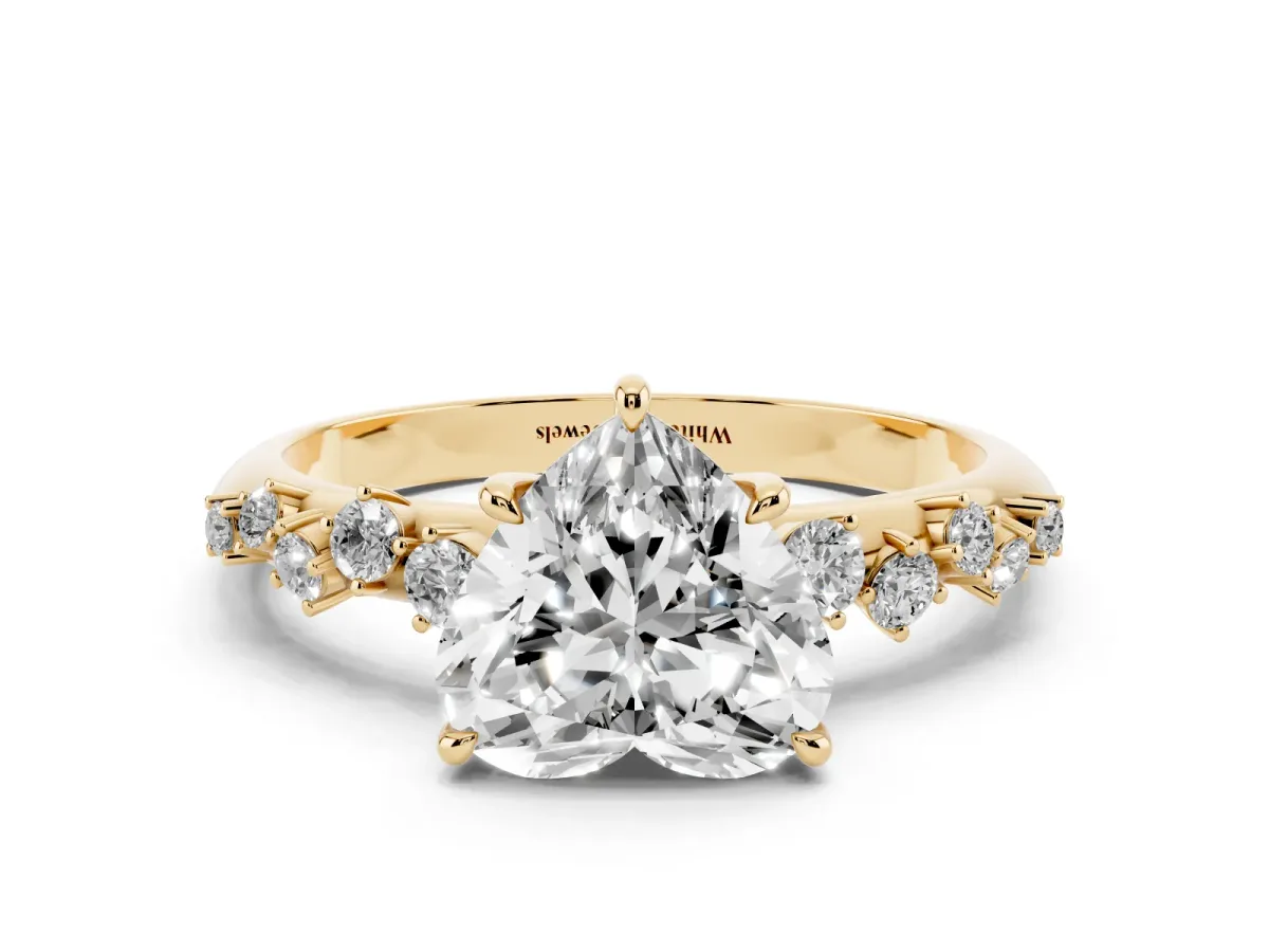 Heart Cut Diamond Cluster Side Stone Solitaire Ring with Prong Setting Yellow gold