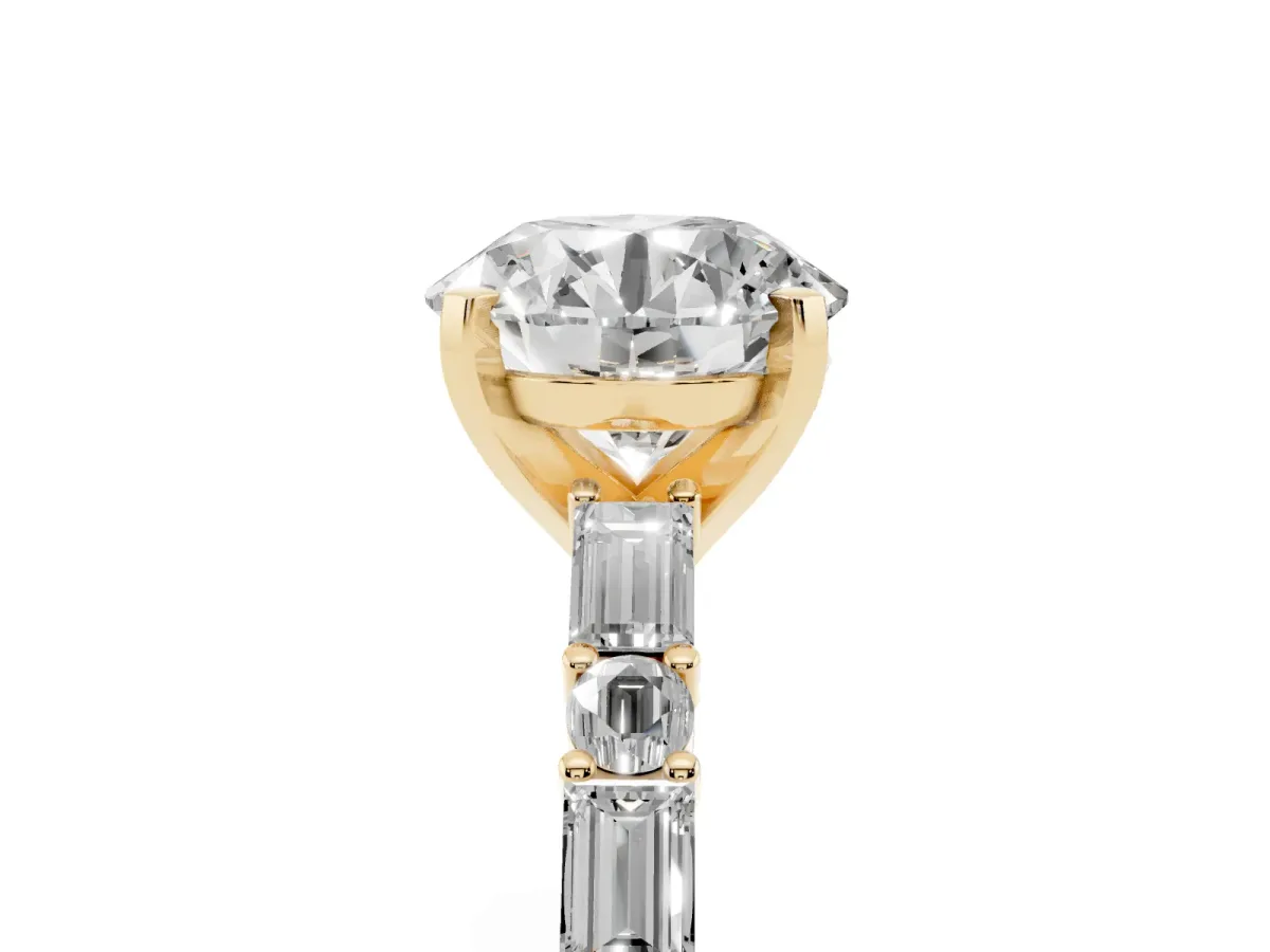 Round Cut Diamond Solitaire with Side Baguettes and Channel Set Band Yellow gold