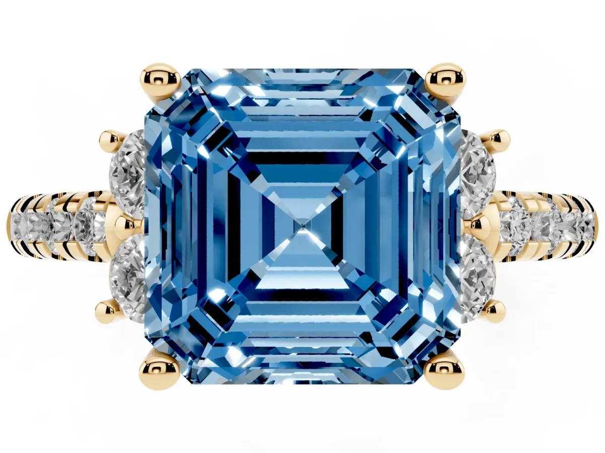 Fancy Blue Asscher Cut Diamond Three-Stone Pave Band with Four-Prong Setting Yellow gold