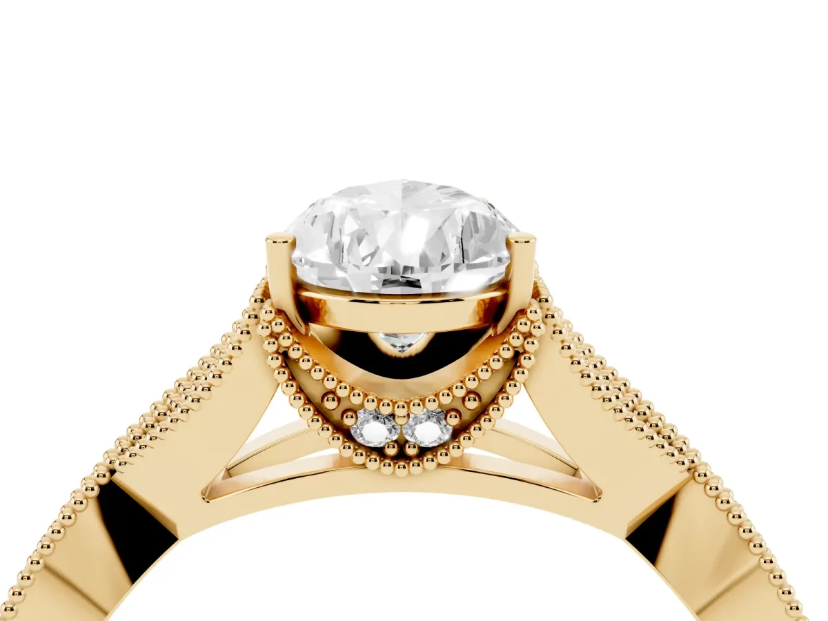 Pear Cut Cut Diamond Twisted Band with Milgrain Pave Setting and Four-Prong Setting Yellow gold