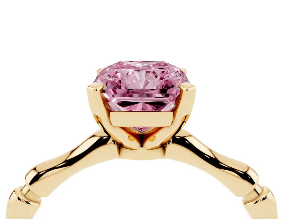 Fancy Pink Radiant Cut Solitaire Diamond Ring with Bamboo Band and Four-Prong Setting Yellow gold