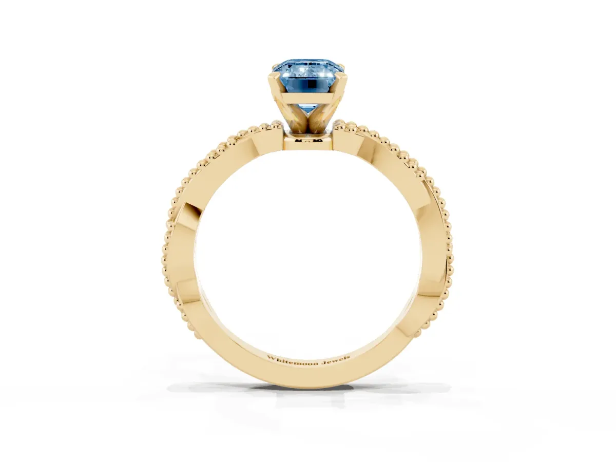 Fancy Blue Emerald Cut Solitaire Twisted Band with Bead Prong Setting Yellow gold