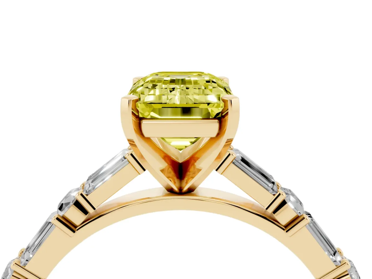 Fancy Yellow Emerald Cut Diamond Solitaire with Side Baguettes and Channel Set Band Yellow gold