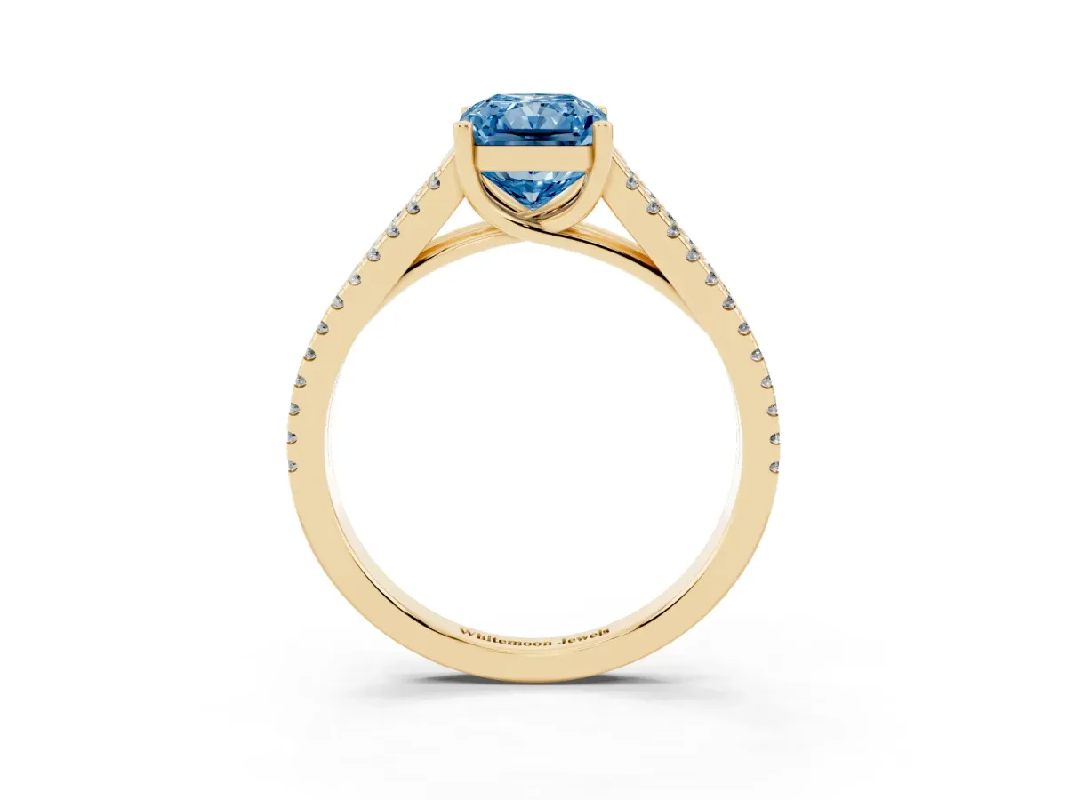 Fancy Blue Radiant Cut Diamond Solitaire Engagement Ring with Split Shank Pavé Band Yellow gold