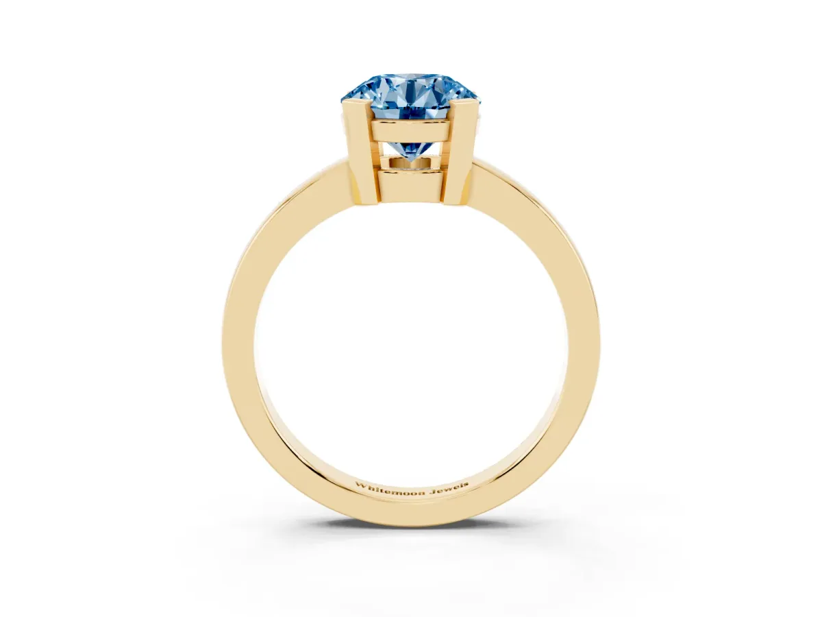 Fancy Blue Round Cut Cut Solitaire Ring with Four-Prong Setting and Classic Band Yellow gold
