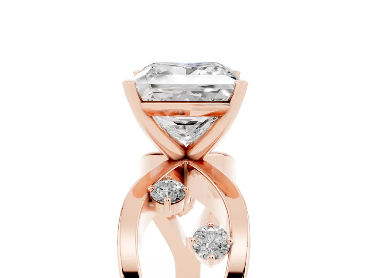 Princess Cut Cut Solitaire Diamond with Side Stones on Criss-Cross Band and Four-Prong Setting Rose gold