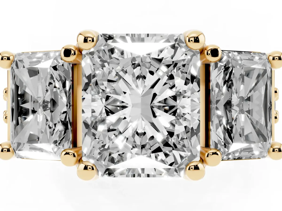 Radiant Cut Diamond Three-Stone Ring with Channel Set Band and Four-Prong Setting Yellow gold