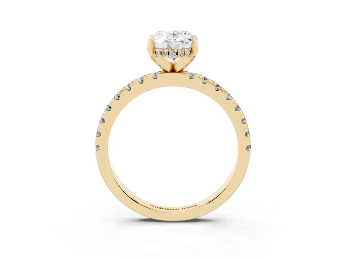 Oval Cut Diamond Solitaire Ring with Round Pavé Band and Four-Prong Setting Yellow gold