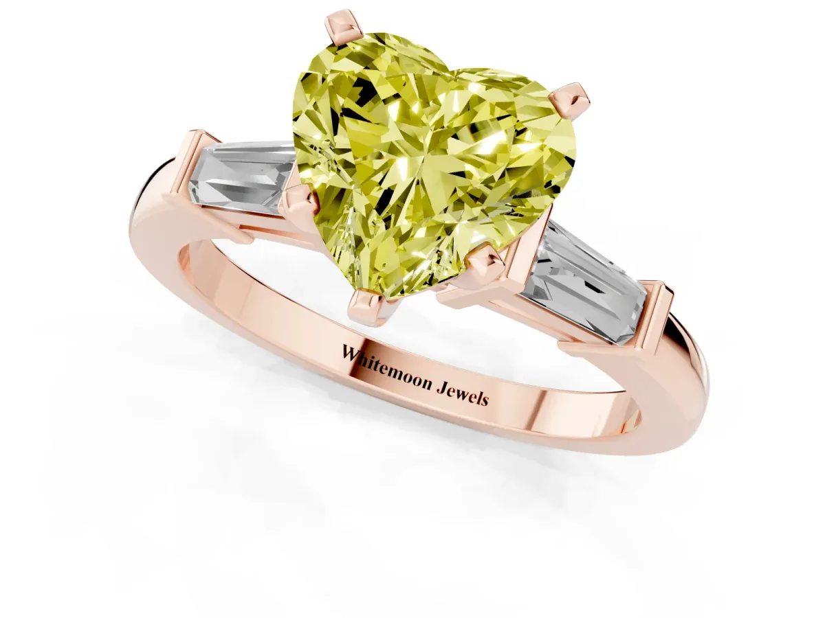 Fancy Yellow Heart Cut Cut Diamond Solitaire Ring with Tapered Baguette Accents and Four-Prong Setting Rose gold