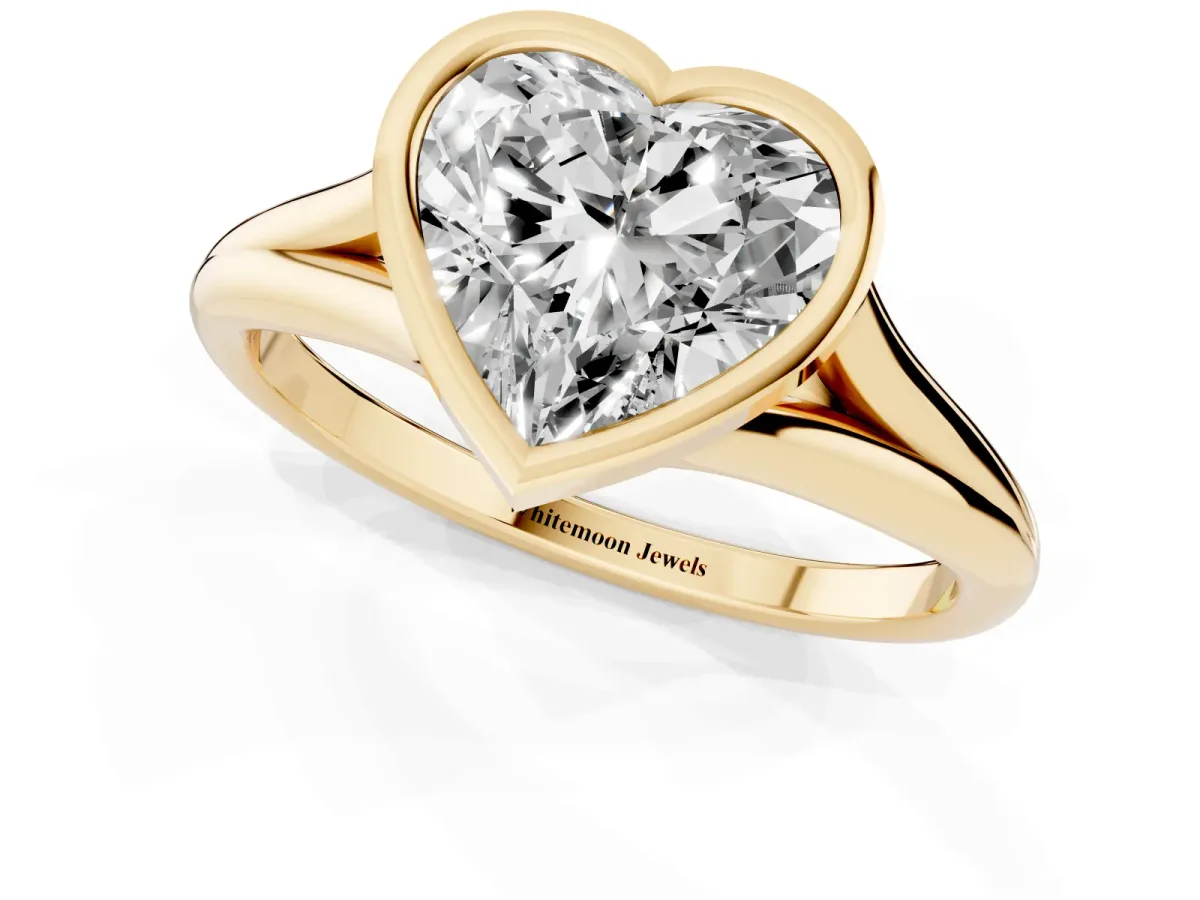 Bezel Set Heart Cut Cut Solitaire Ring with Tapered Band Yellow gold