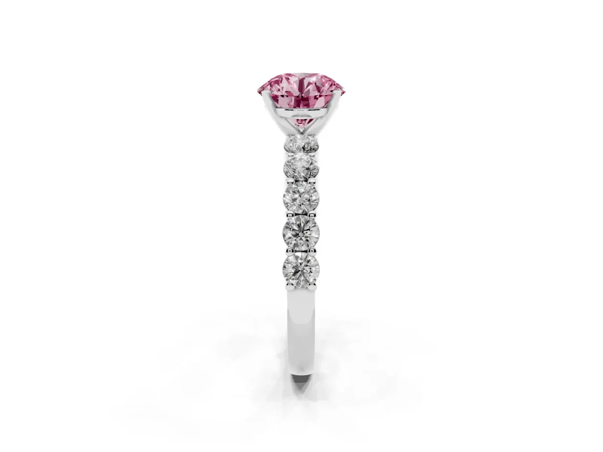 Fancy Pink Round Cut Diamond Solitaire Ring with Shared Prong Round Side Stones Platinum