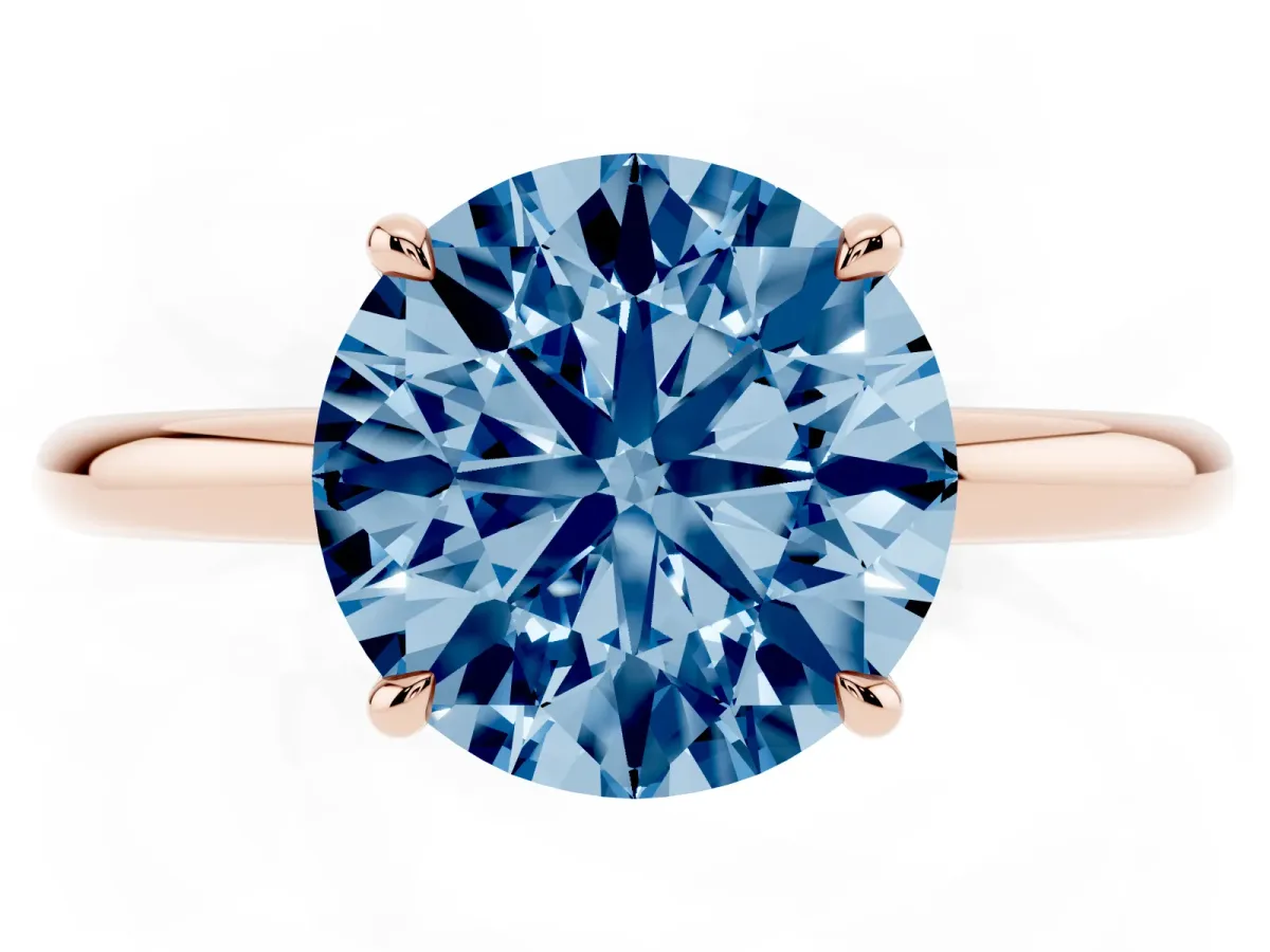 Fancy Blue Round Cut Diamond Solitaire Ring with Thin Band and Four-Prong Setting Rose gold
