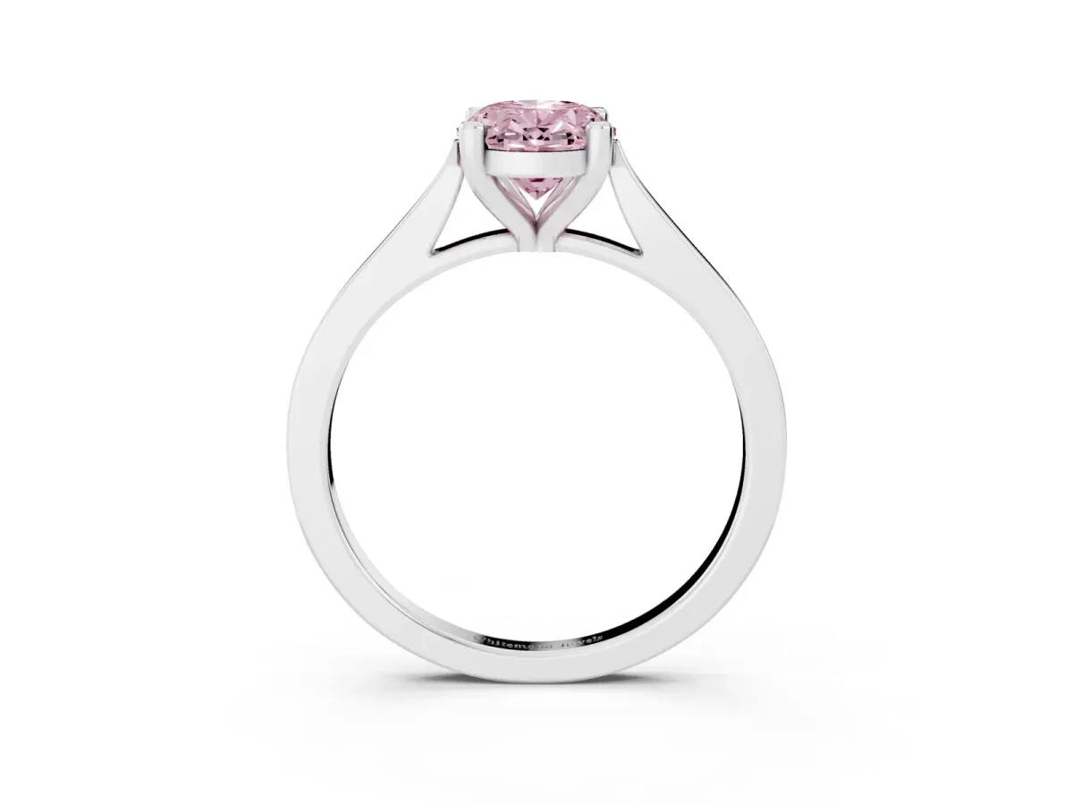 Fancy Pink Oval Cut Solitaire Diamond Ring with Four-Prong Setting and Tapered Band Platinum