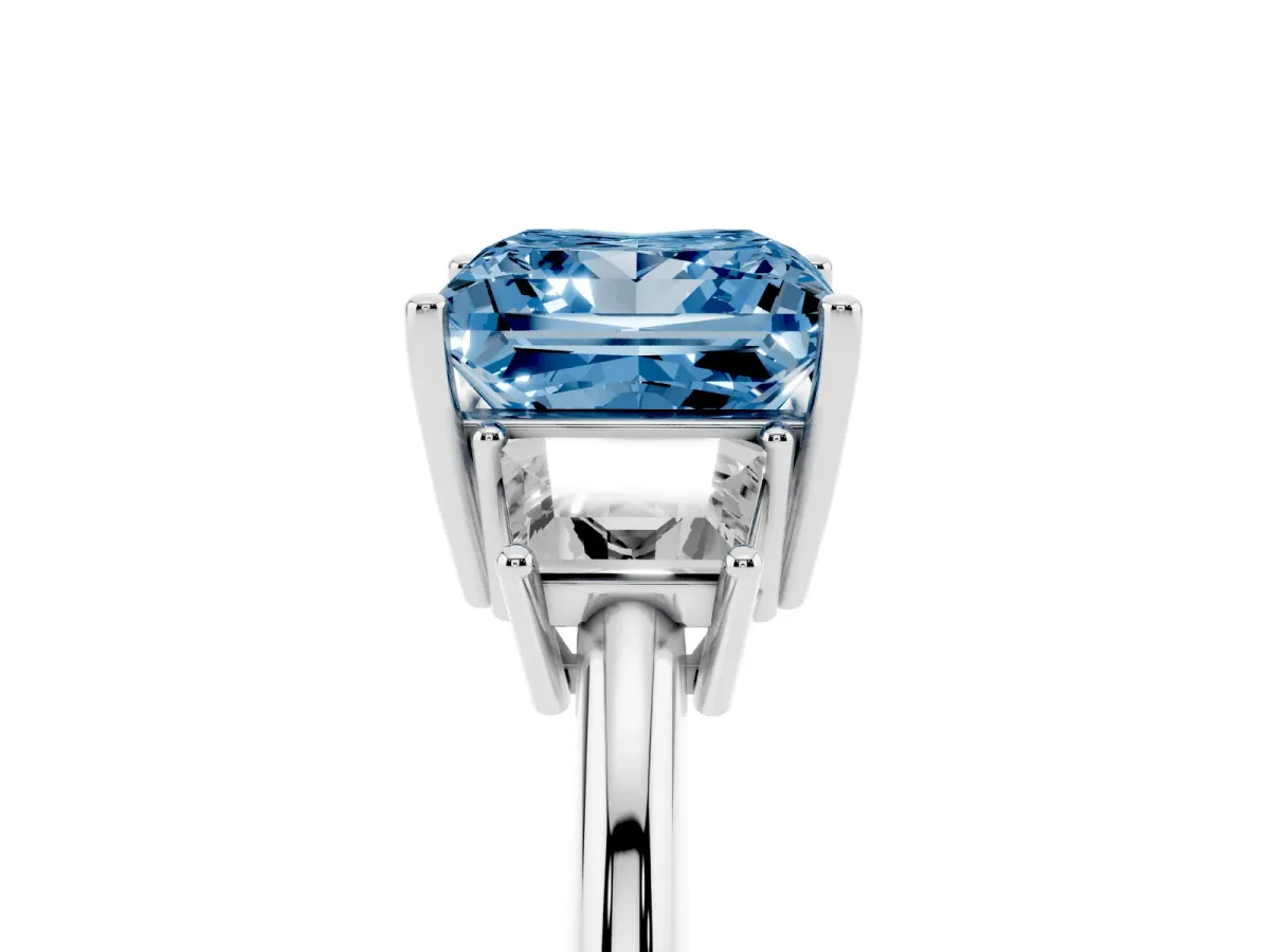 Fancy Blue Princess Cut Diamond Three-Stone Ring with Trapezoid Side Stones and Prong Setting Silver