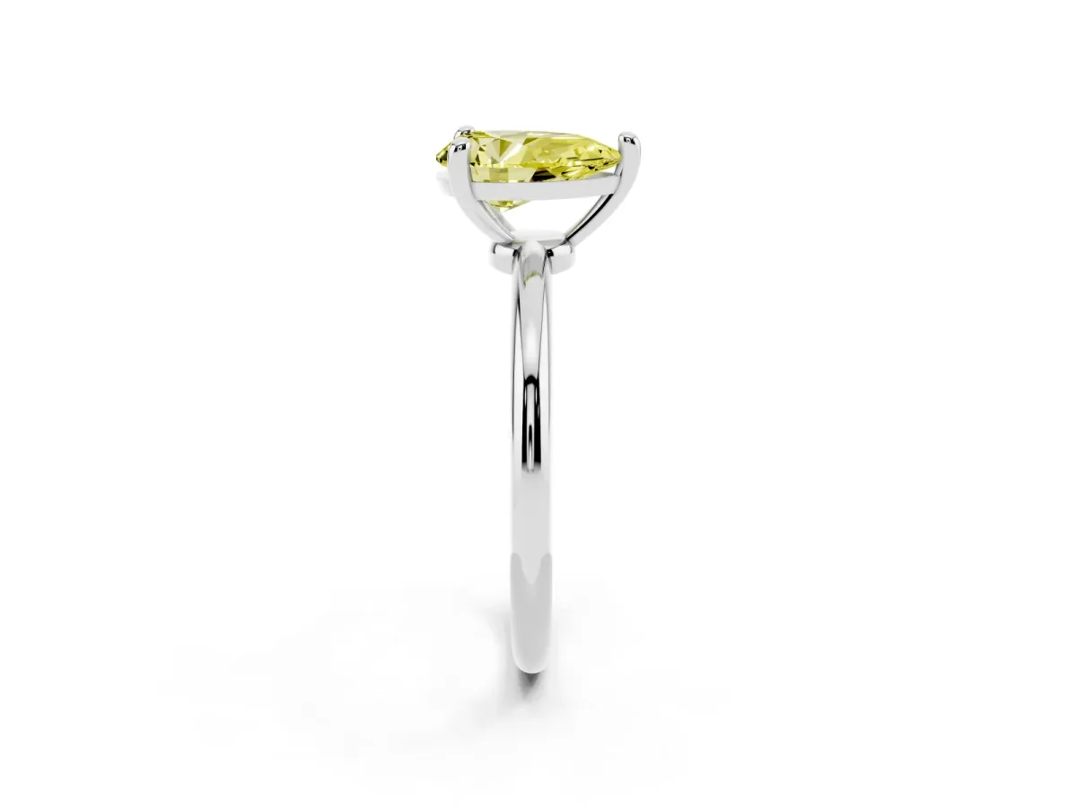Fancy Yellow Pear Cut Solitaire Diamond Ring with 4-Prong Setting on a Classic Band Silver