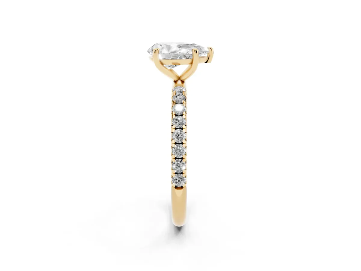 Pear Cut Cut Diamond Solitaire Ring with Micro Pave Band and Four Prong Setting Yellow gold