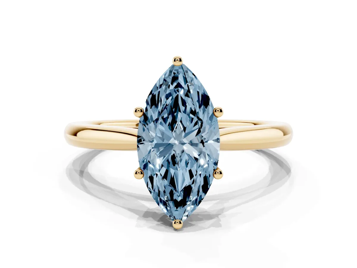 Fancy Blue Marquise Cut Cut Solitaire Ring with Cathedral Band and Four-Prong Setting Yellow gold
