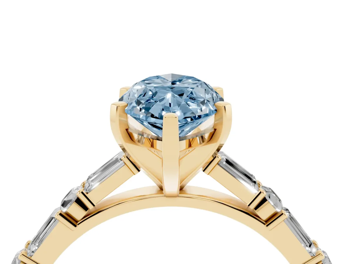 Fancy Blue Marquise Cut Diamond Solitaire with Side Baguettes and Channel Set Band Yellow gold