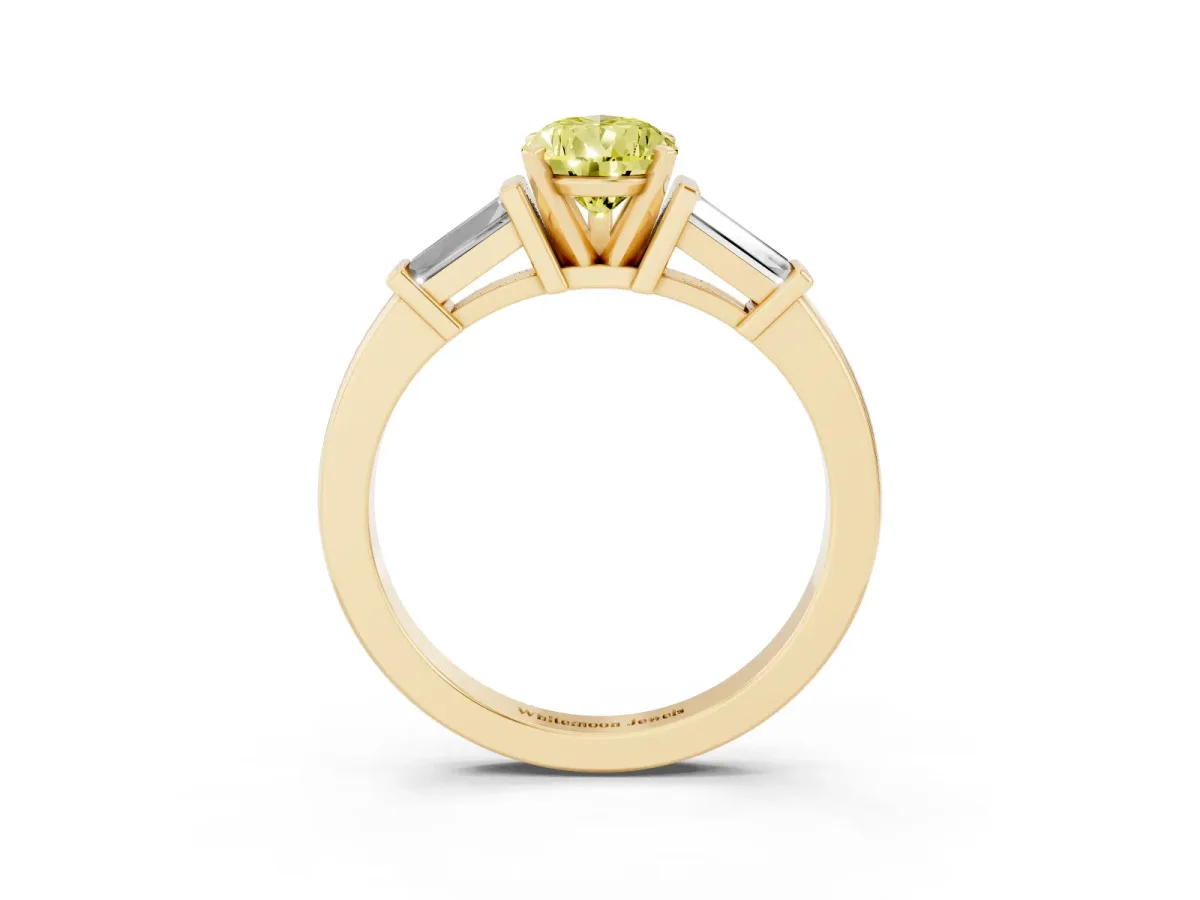 Fancy Yellow Pear Cut Cut Diamond Solitaire Ring with Tapered Baguette Accents and Four-Prong Setting Yellow gold