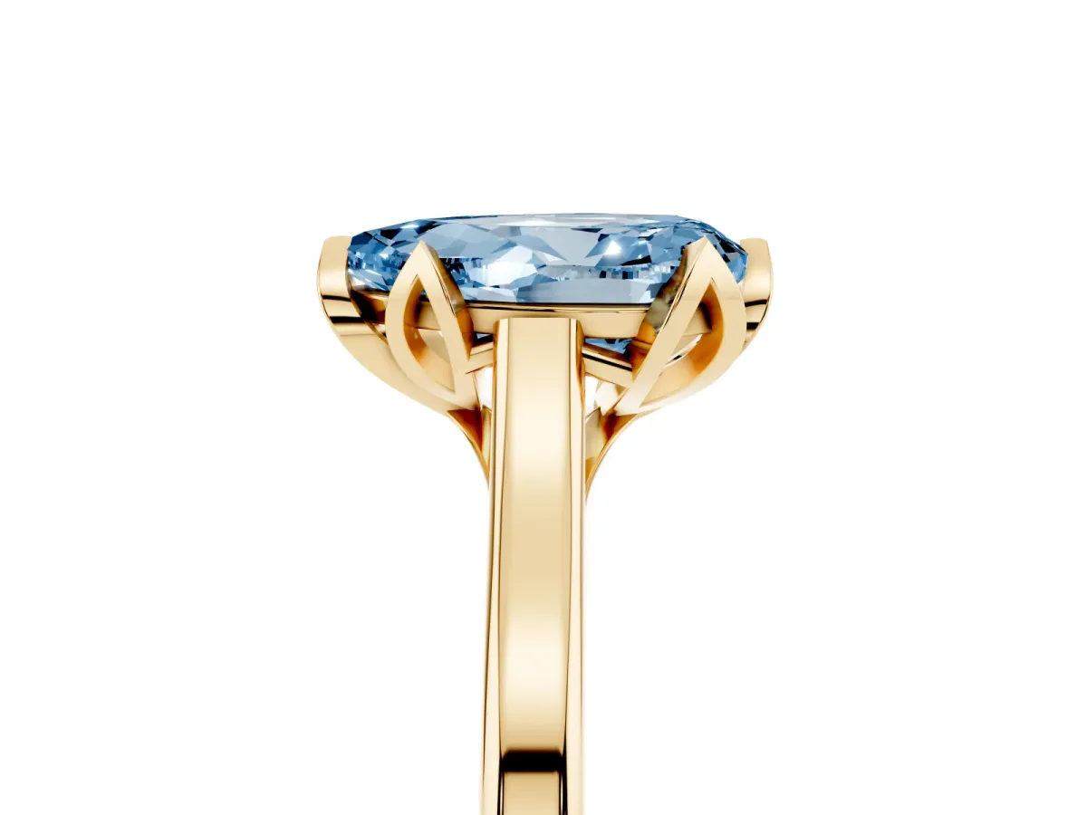 Fancy Blue Pear Cut Diamond Solitaire Ring with Flower Prong Setting and Classic Band Yellow gold