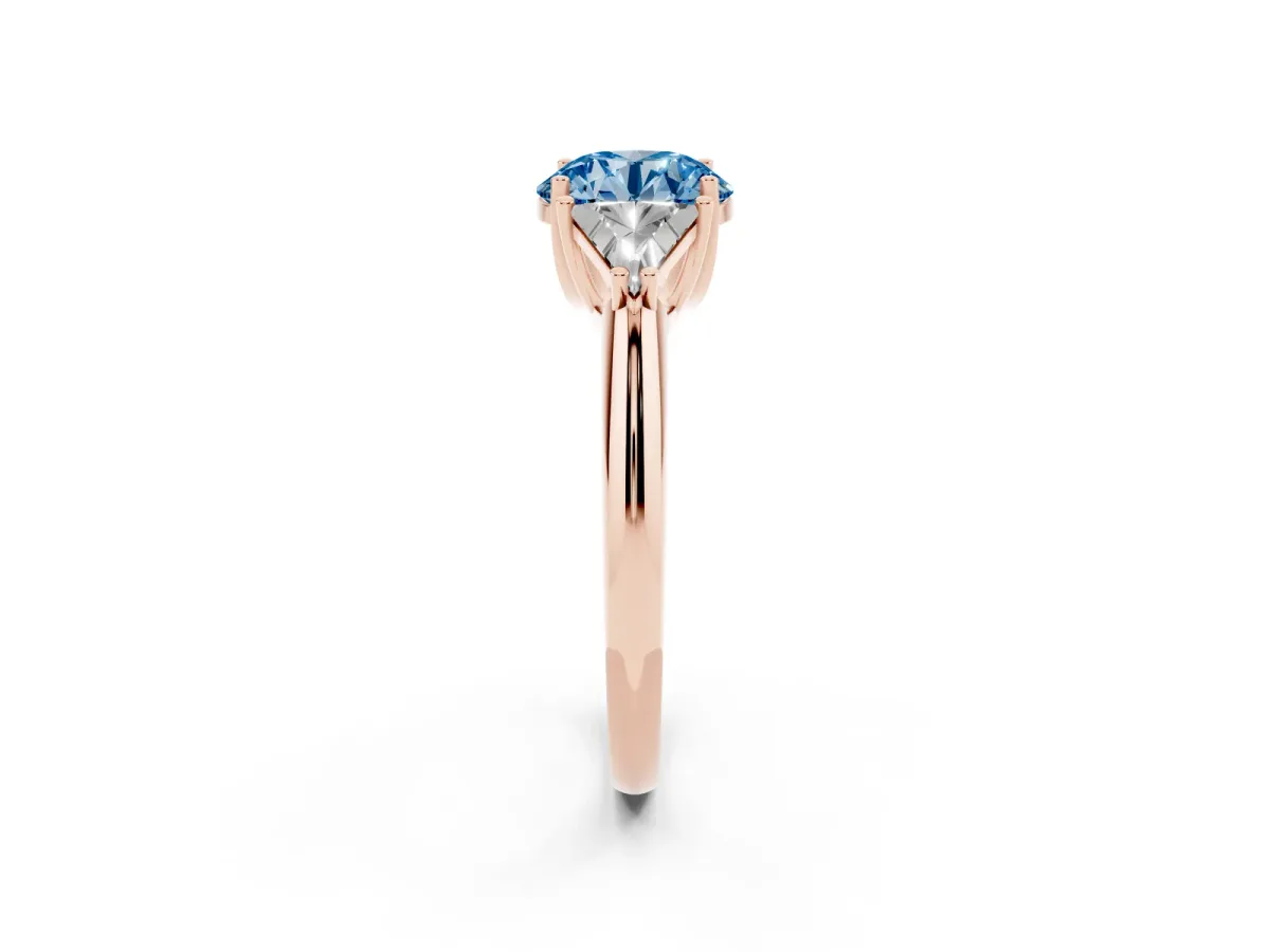 Fancy Blue Three-Stone Round Cut Diamond Engagement Ring with Trillion Side Stones and Prong Setting Rose gold