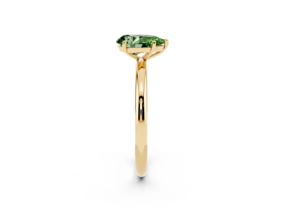 Fancy Green Pear Cut Solitaire Diamond Ring with Four-Prong Setting on a Plain Band Yellow gold