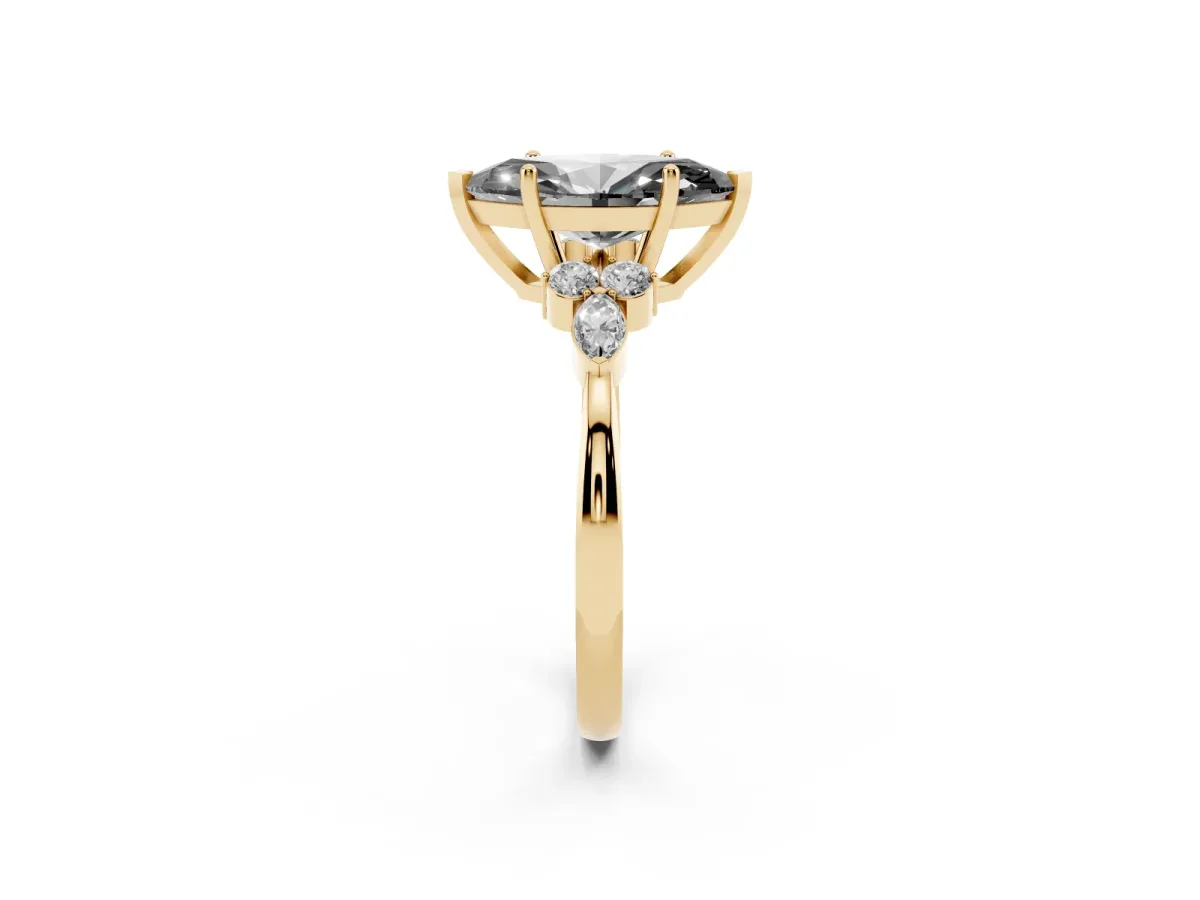Fancy Black Marquise Cut Brilliant Diamond Solitaire Ring with Pear Side Stones and Four-Prong Setting Yellow gold