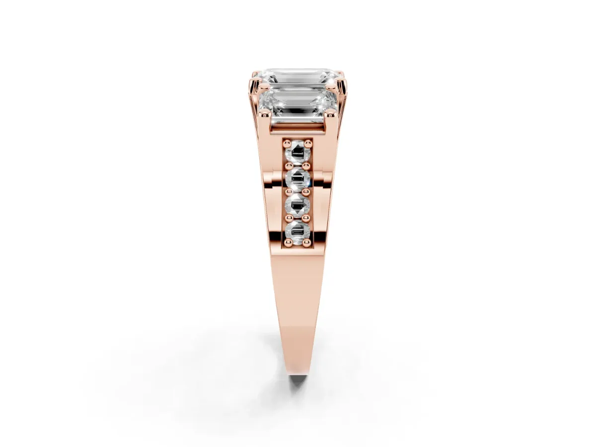 Emerald Cut Diamond Three-Stone Ring with Channel Set Band and Four-Prong Setting Rose gold