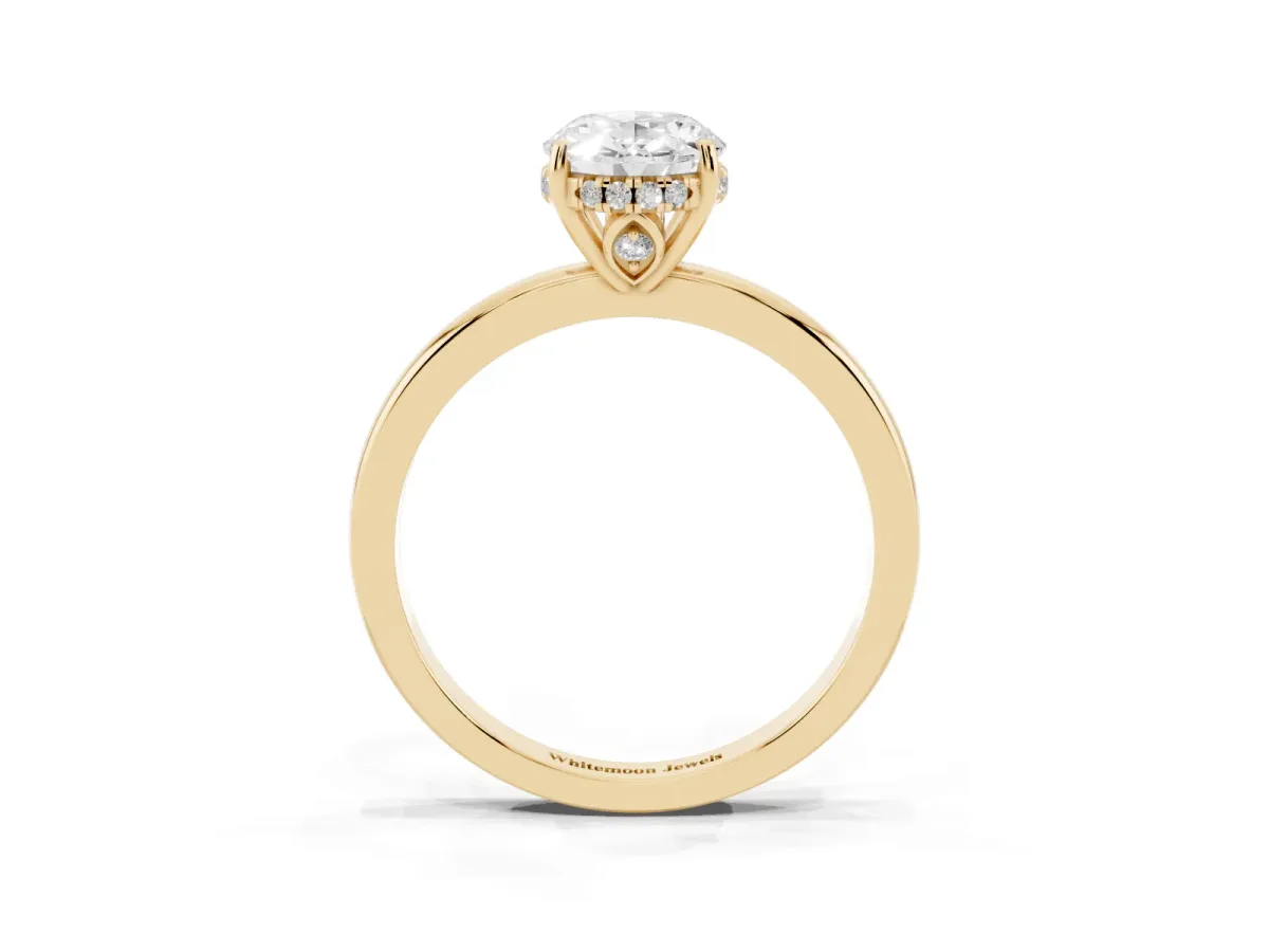 Oval Cut Solitaire Diamond Ring with Prong Setting and Plain Band Yellow gold