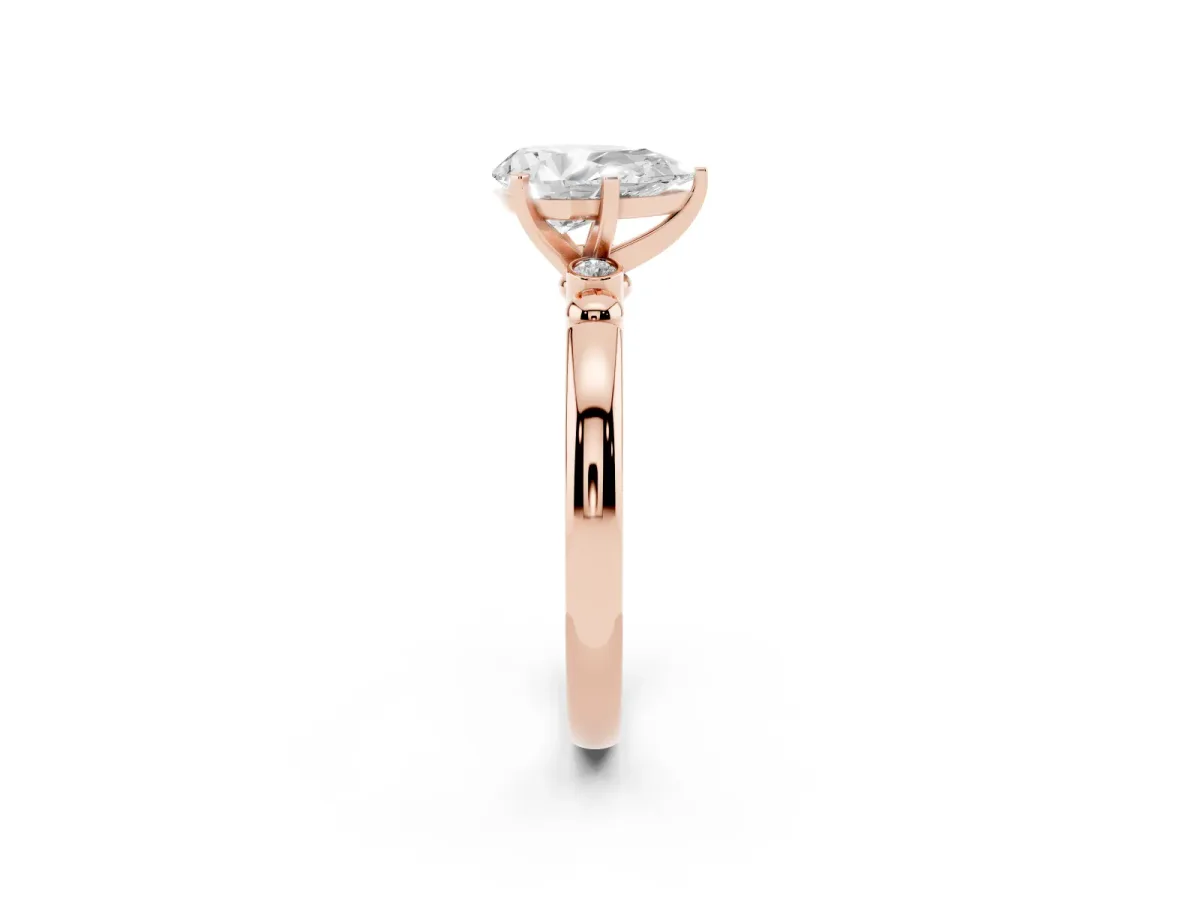 Pear Cut Solitaire Beaded Band with Four-Prong Setting Rose gold