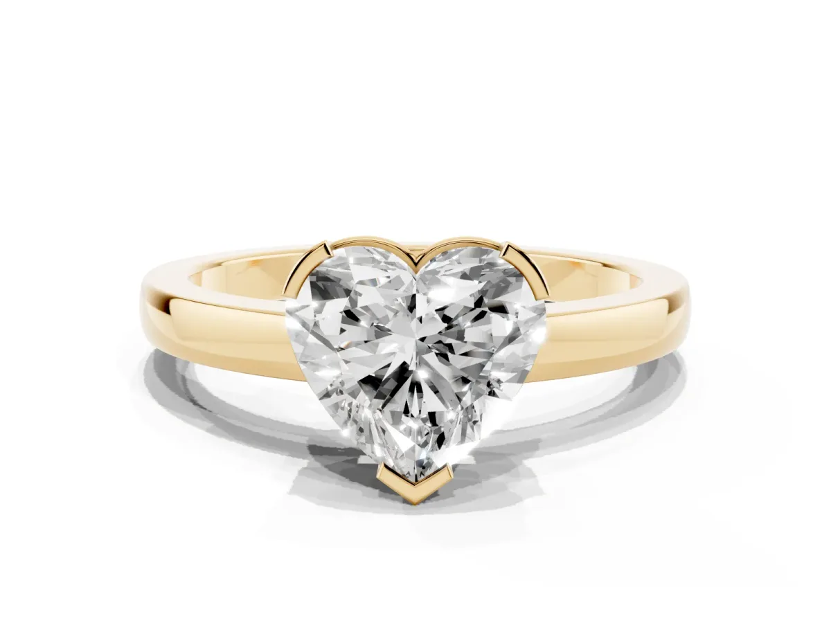 Heart Cut Cut Solitaire Ring with Four-Prong Setting and Classic Band Yellow gold